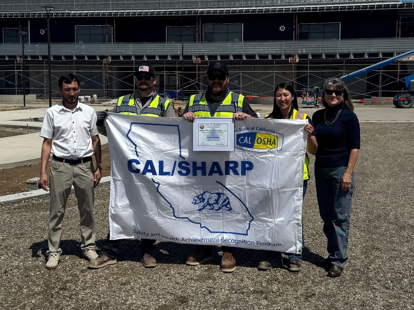 Photo of Balfour Beatty staff receiving a SHARP award.